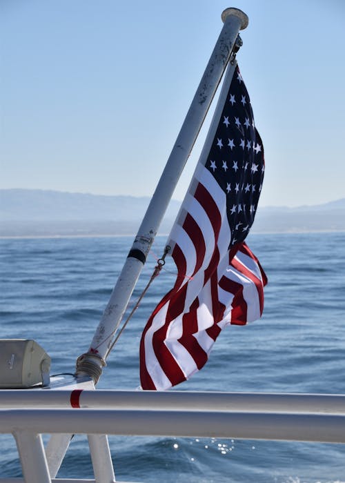 Бесплатное стоковое фото с американский флаг, вертикальный выстрел, крупный план