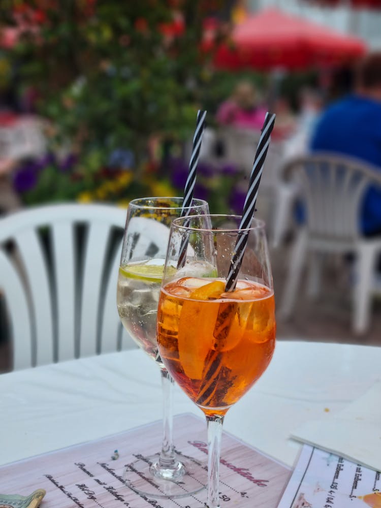 Cocktail Glasses With Straws On Table