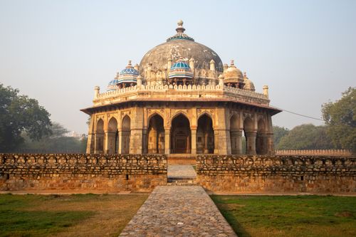 Free Stunning view of an ancient tomb in Delhi featuring intricate arches and a prominent dome, set in a historical landscape. Stock Photo