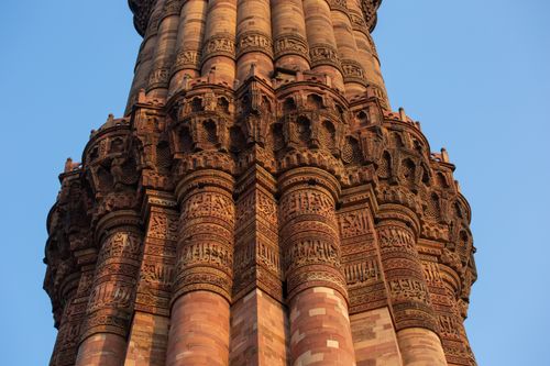 Free Close-up of Qutub Minar showcasing its intricate architectural details. UNESCO World Heritage Site in Delhi, India. Stock Photo
