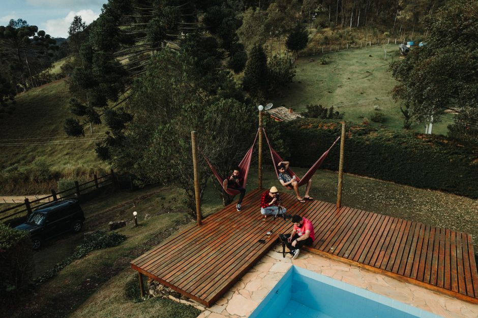 Travelers relaxing in hammocks on an Amazon riverboat in Brazil