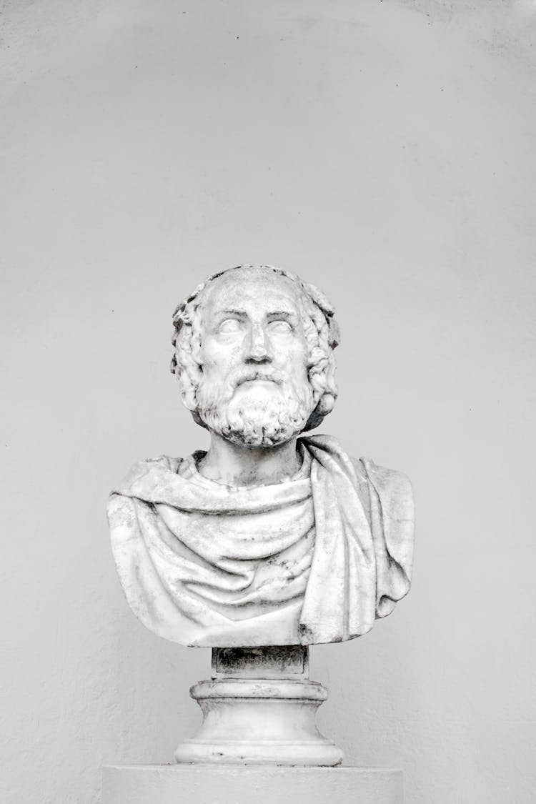 Bust Of Ancient Philosopher On Grey Background