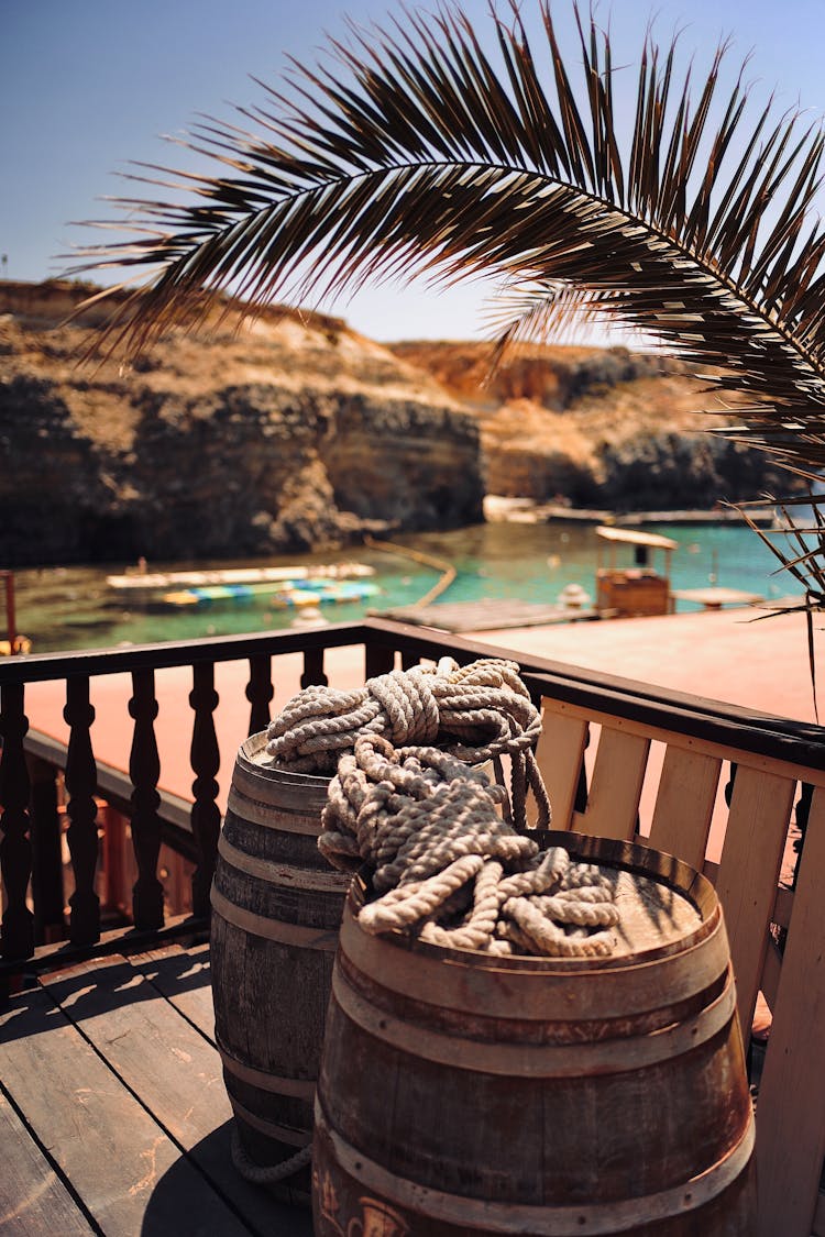 Brown Ropes On Wooden Barrels