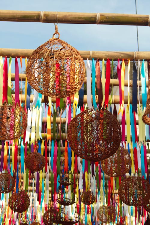 Wicker Basket hanging on Bamboo Sticks