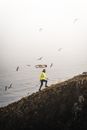 Man Walking up the Hill