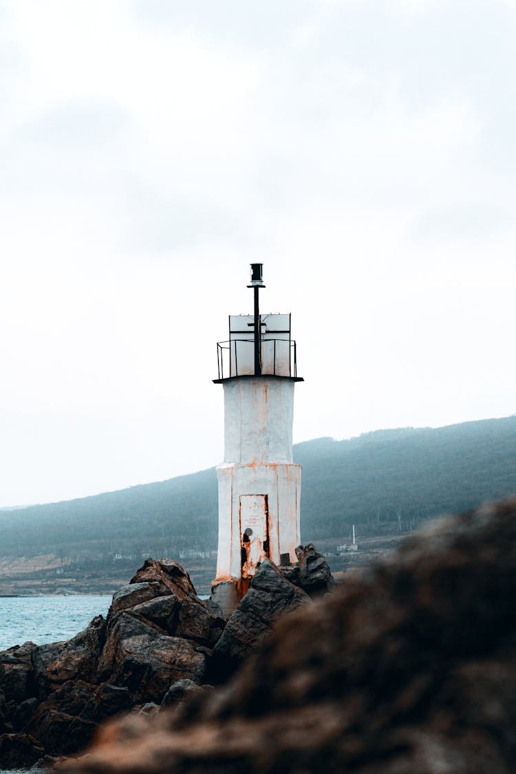 Rocky Seacoast With A Lighthouse