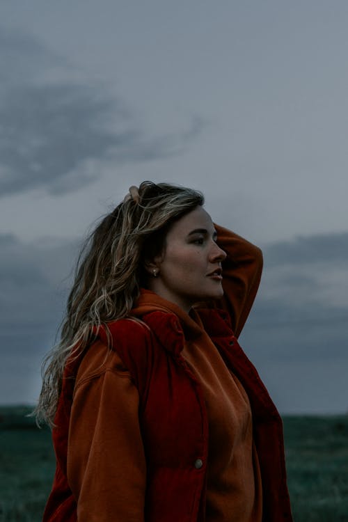 Woman in Red Vest Looking Afar