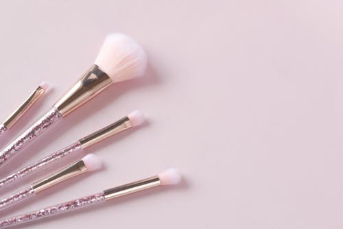 Makeup Brushes on Pink Background