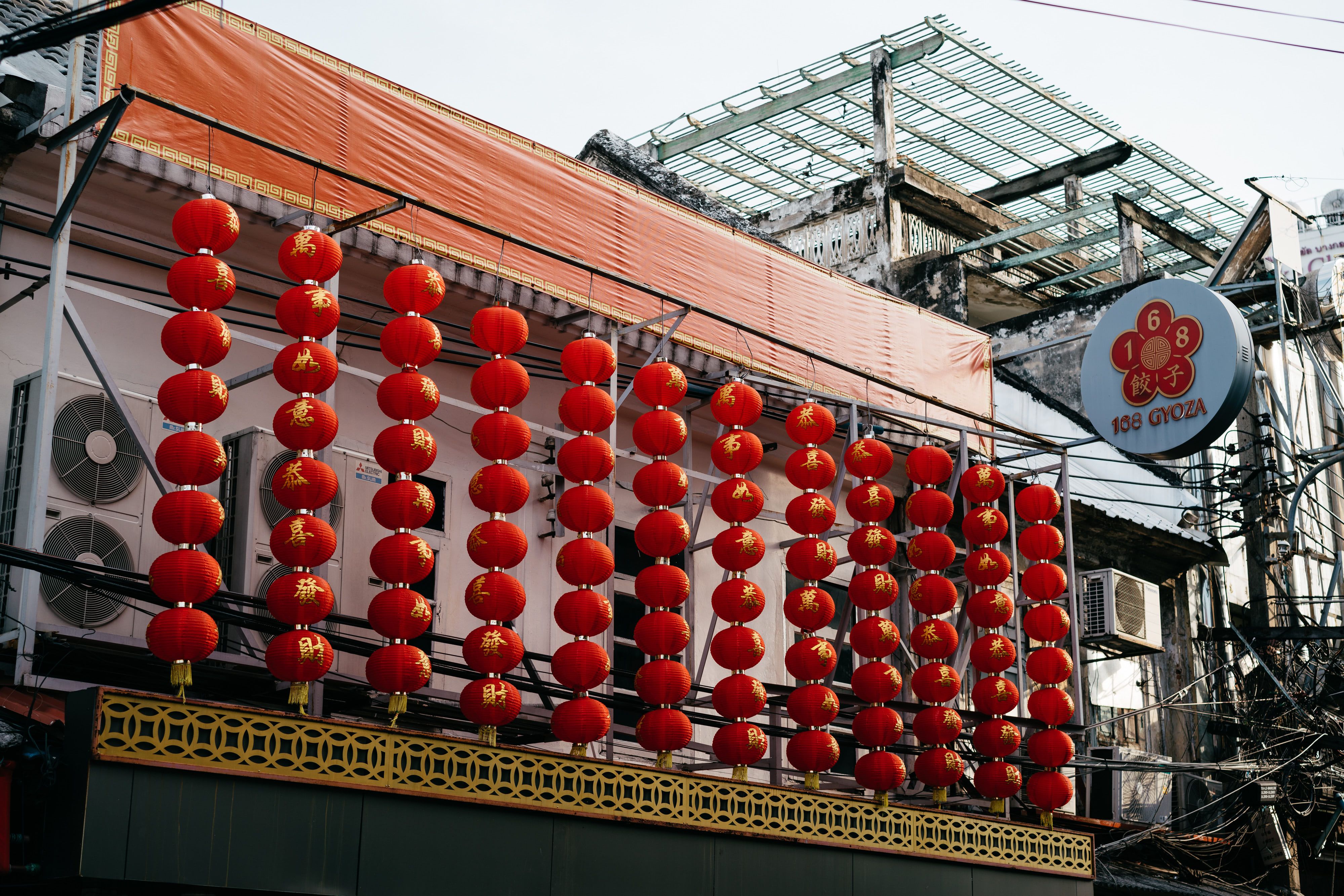 Red Chinese Lanterns Outside Building · Free Stock Photo