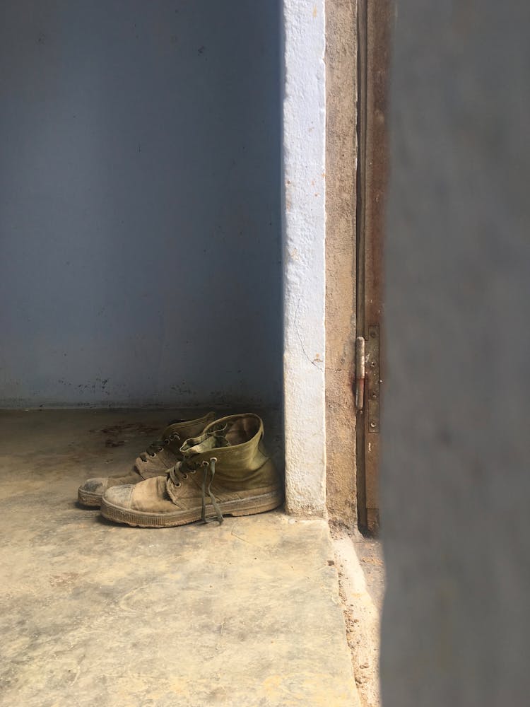 Old Shoes By A Door