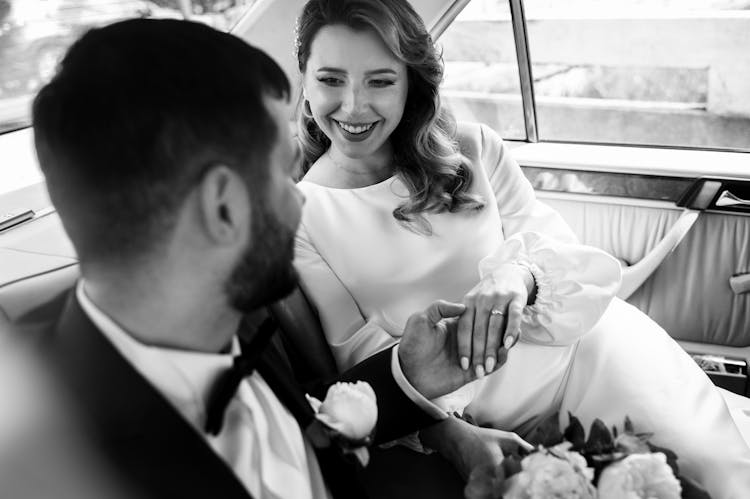 Newlyweds Sitting In Car