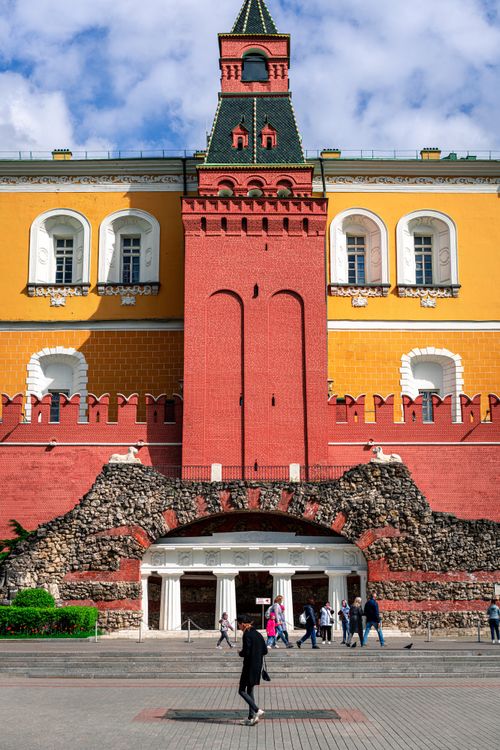 Free The colorful Kremlin wall in Moscow with tourists exploring the area. Stock Photo