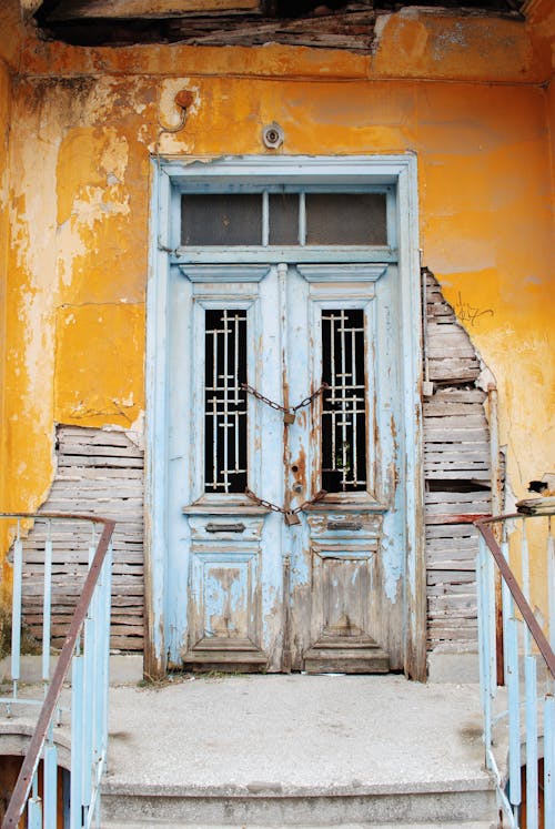 Wooden Door With Chain and Padlock 