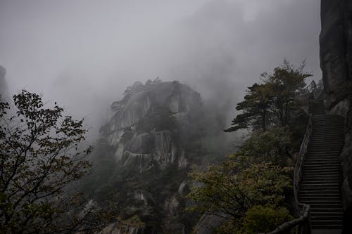 Stairs on Mountains Landscape in Fog