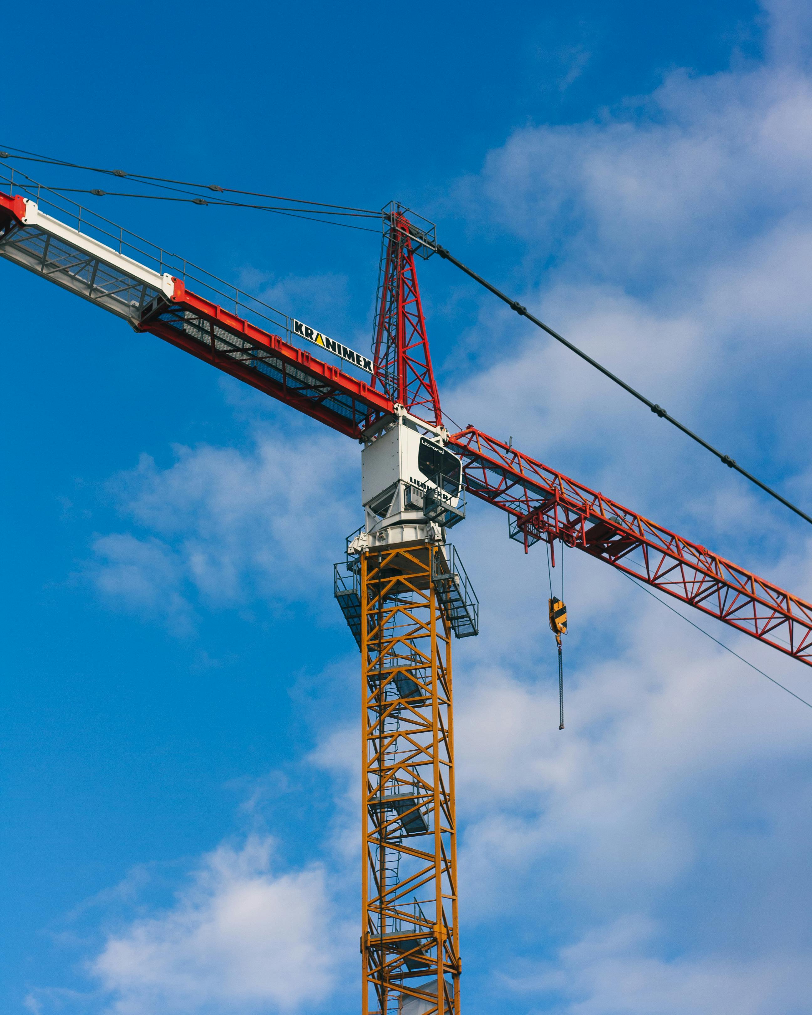 Construction Crane and Cloud behind · Free Stock Photo