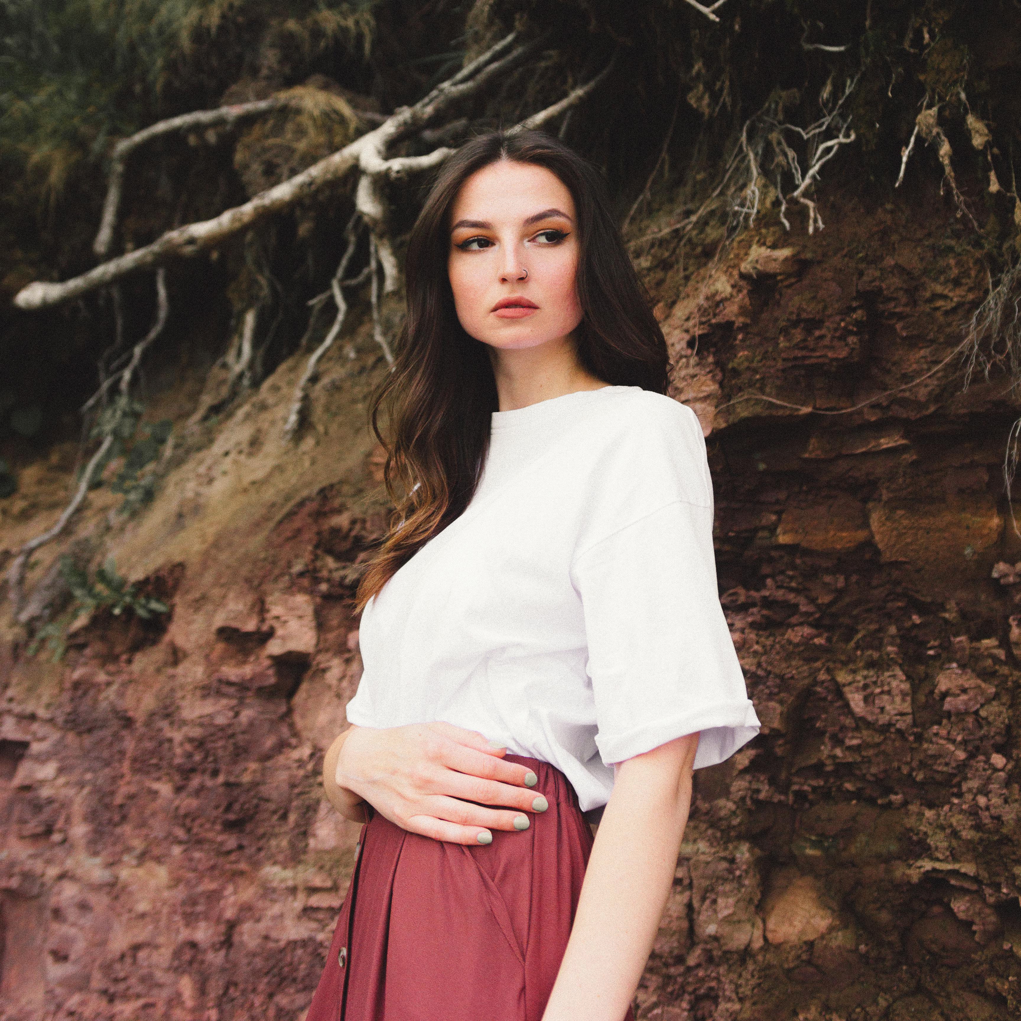 Woman in Skirt and Blouse · Free Stock Photo