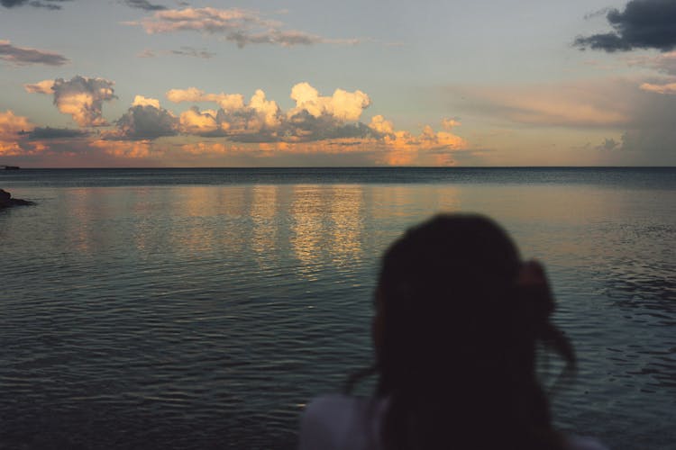 Woman Head And Sea Behind