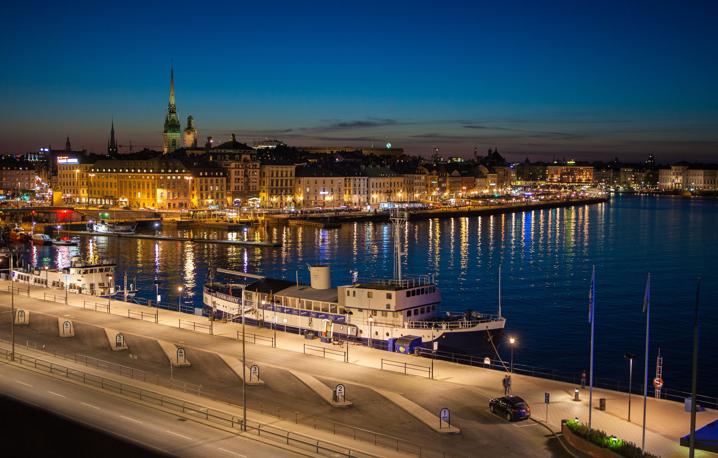 Stockholm waterfront at night — home of Fluid Translation since 2005
