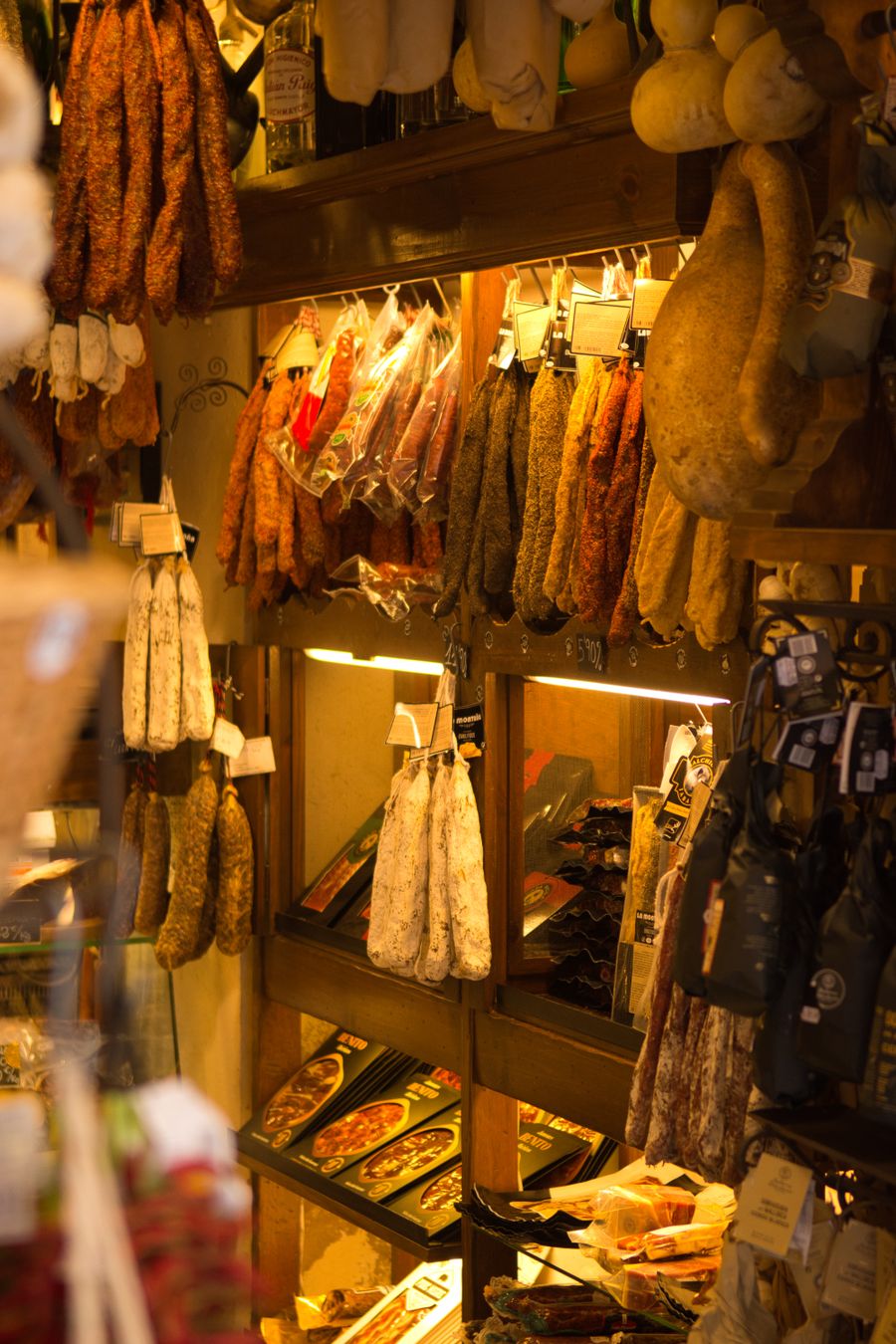 Cured meats hanging in the shop