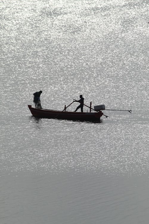Fishermen on a Boat at Sea