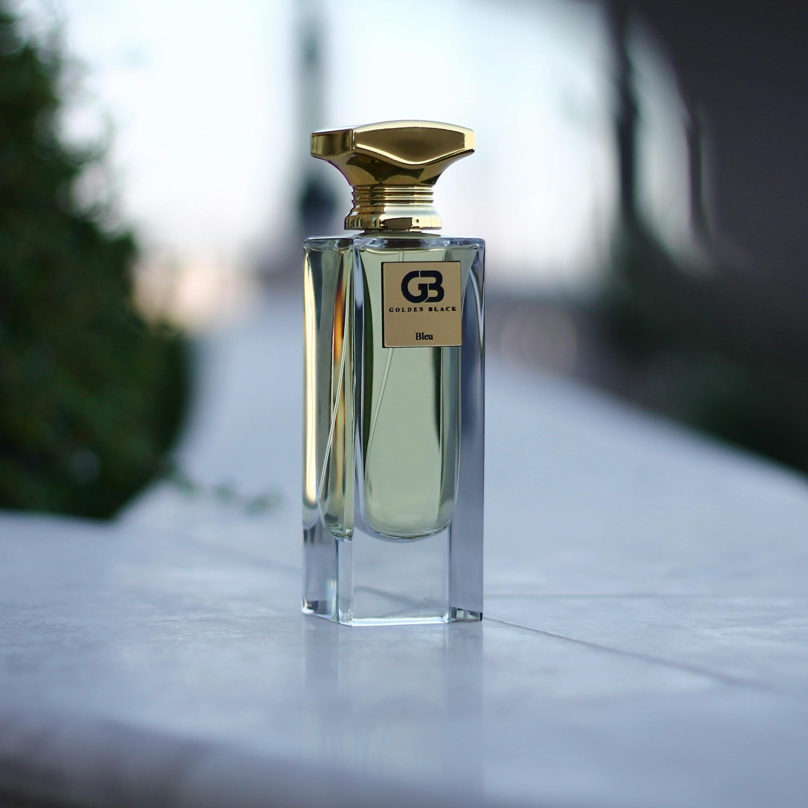 A Glass Perfume Bottle on a Flat Surface