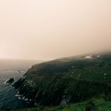 Misty coastal headland, photo by Julia Fuchs on Pexels