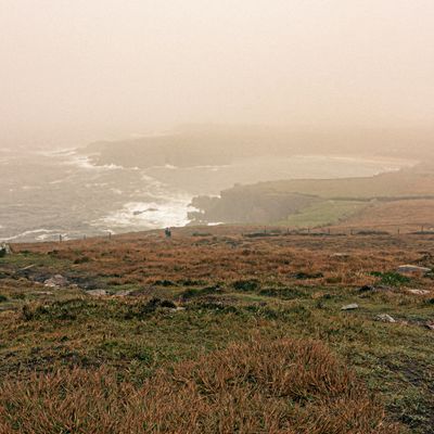 Fog over a rough coastline, photo by Julia Fuchs on Pexels