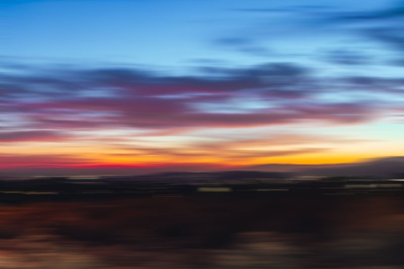 Blurred sunset sky in vivid colour -- photo by Selvin Esteban on Pexels
