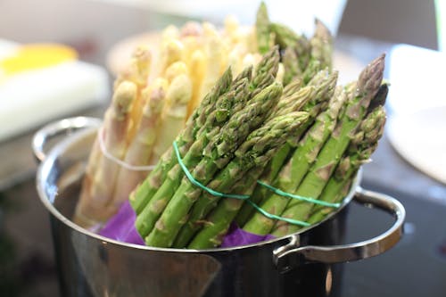 Free fresh asparagus in a bowl Stock Photo