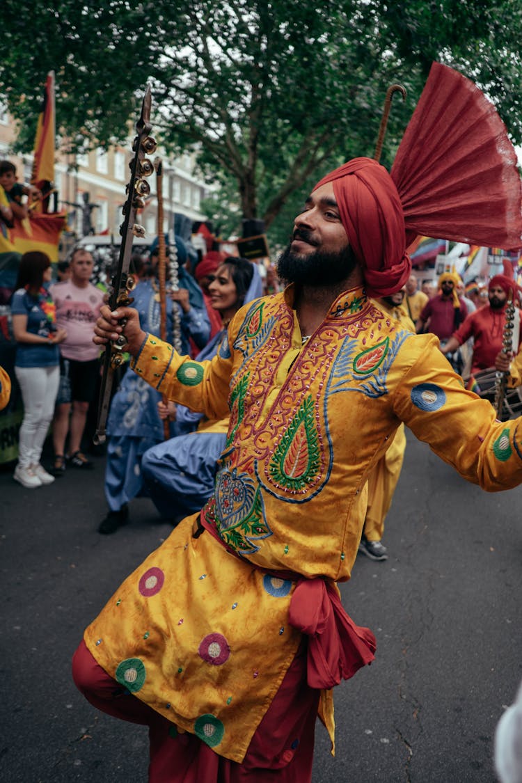 Man Dancing In Costume At Parade