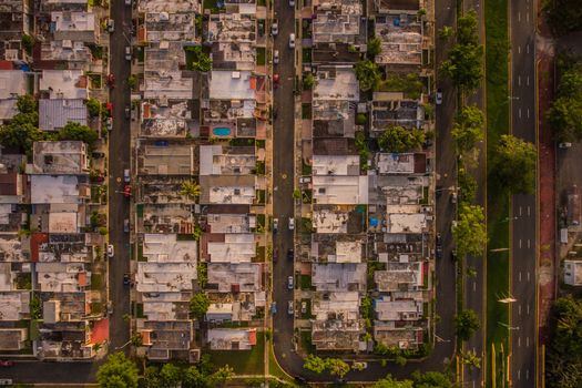 Drone shot capturing rooftops and streets in Levittown, Toa Baja, Puerto Rico.
