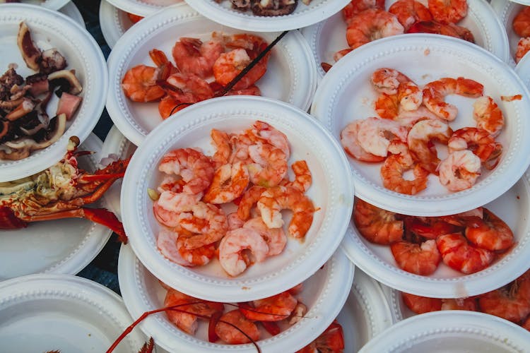 Cooked Prawns On White Plates