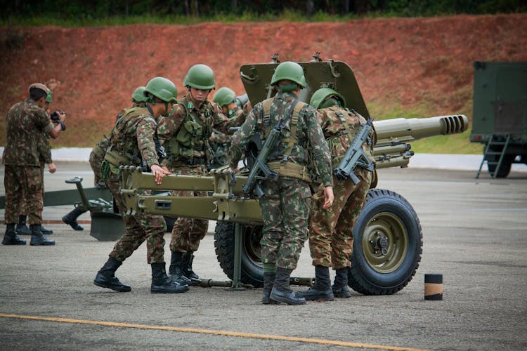 People Wearing Camouflage Uniform During Military Training