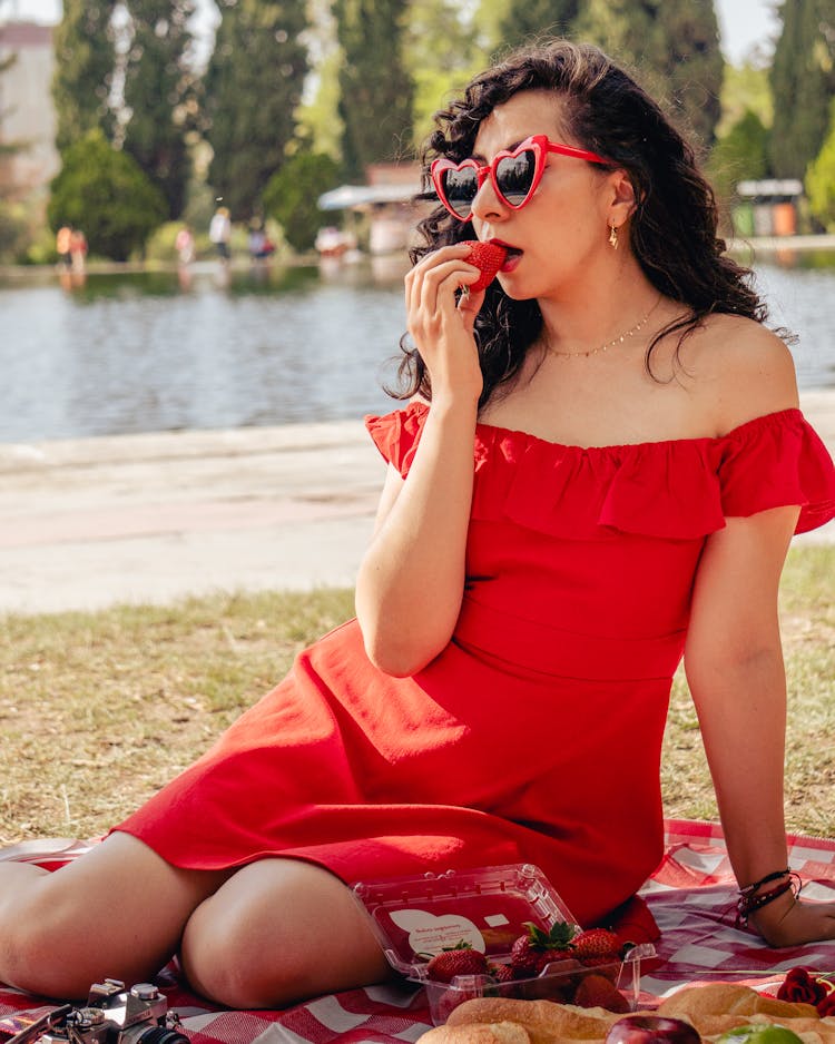 Woman Eating Strawberry