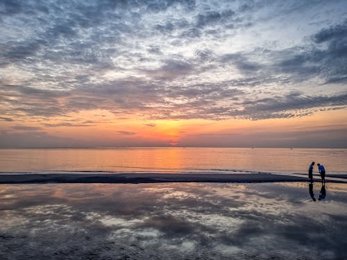 Foto profissional grátis de água, alvorecer, beira-mar