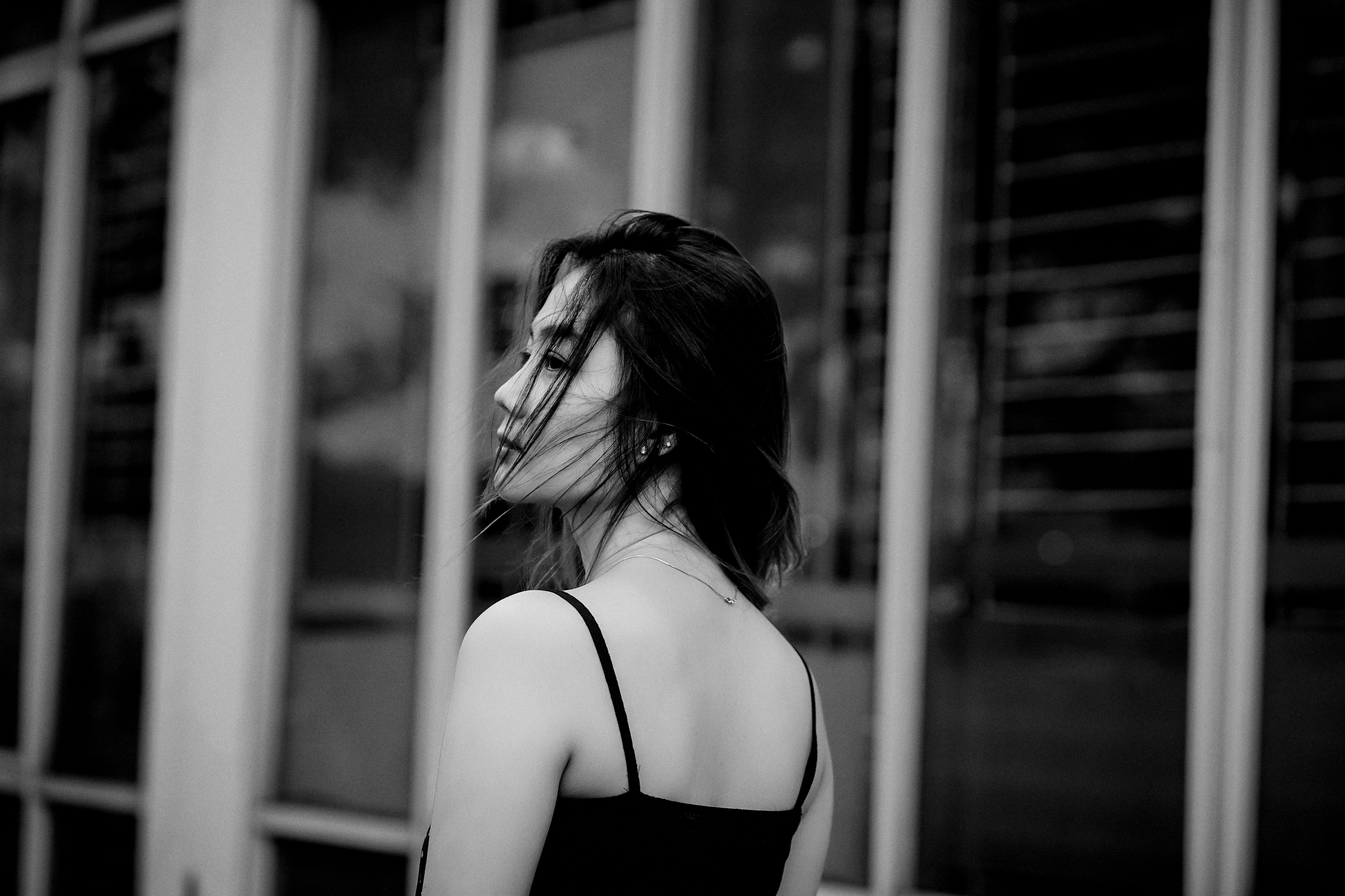 person looking over shoulder street
