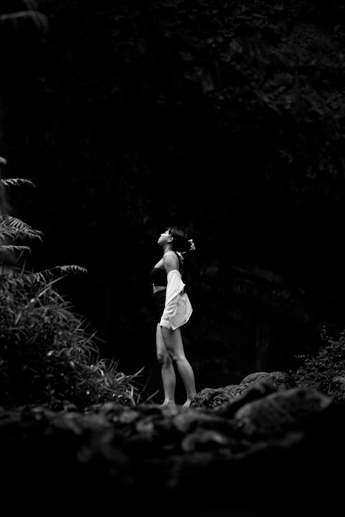 Woman in Black Tank Top and Short Standing