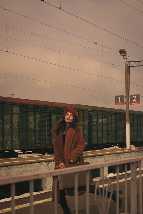 Woman Waiting on a Train Station
