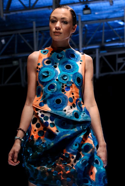 Woman Wearing a Multicolored Sleeveless Dress