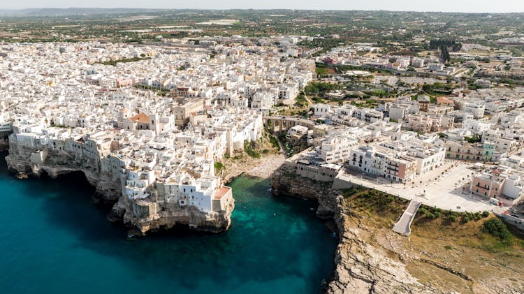 An Aerial Shot Of A Coastal City