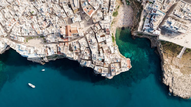 An Aerial Shot Of A Coastal City