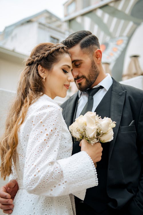 Couple with Flowers Hugging