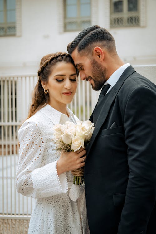 Newlyweds with Flowers