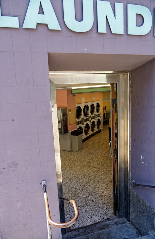 Free stock photo of door, eight, laundromat Stock Photo