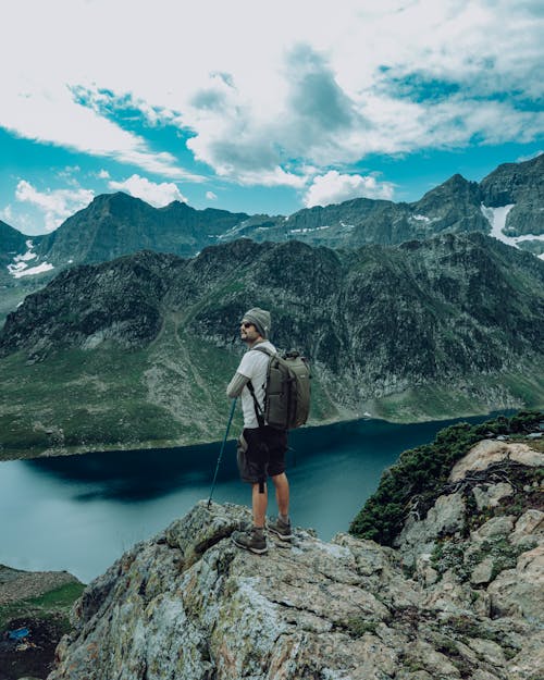 A Man on Top of a Rock Mountain