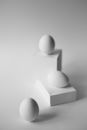 White Eggs on White Square Boxes