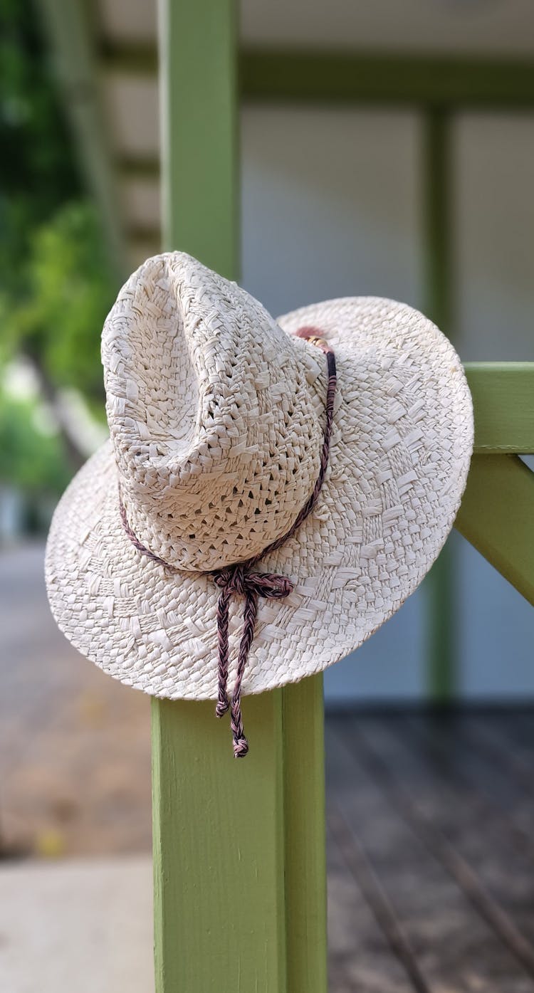 Hat On Green, Wooden Posts