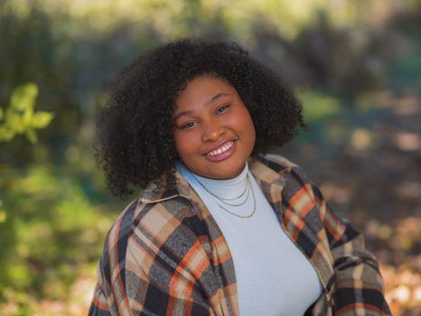 A Woman in Turtleneck Sweater and Checkered Flannel
