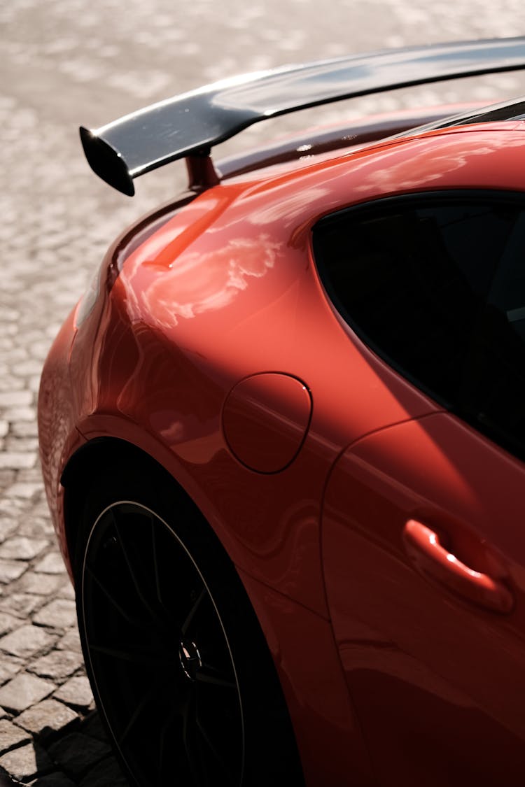 Red Car On Gray Concrete Road