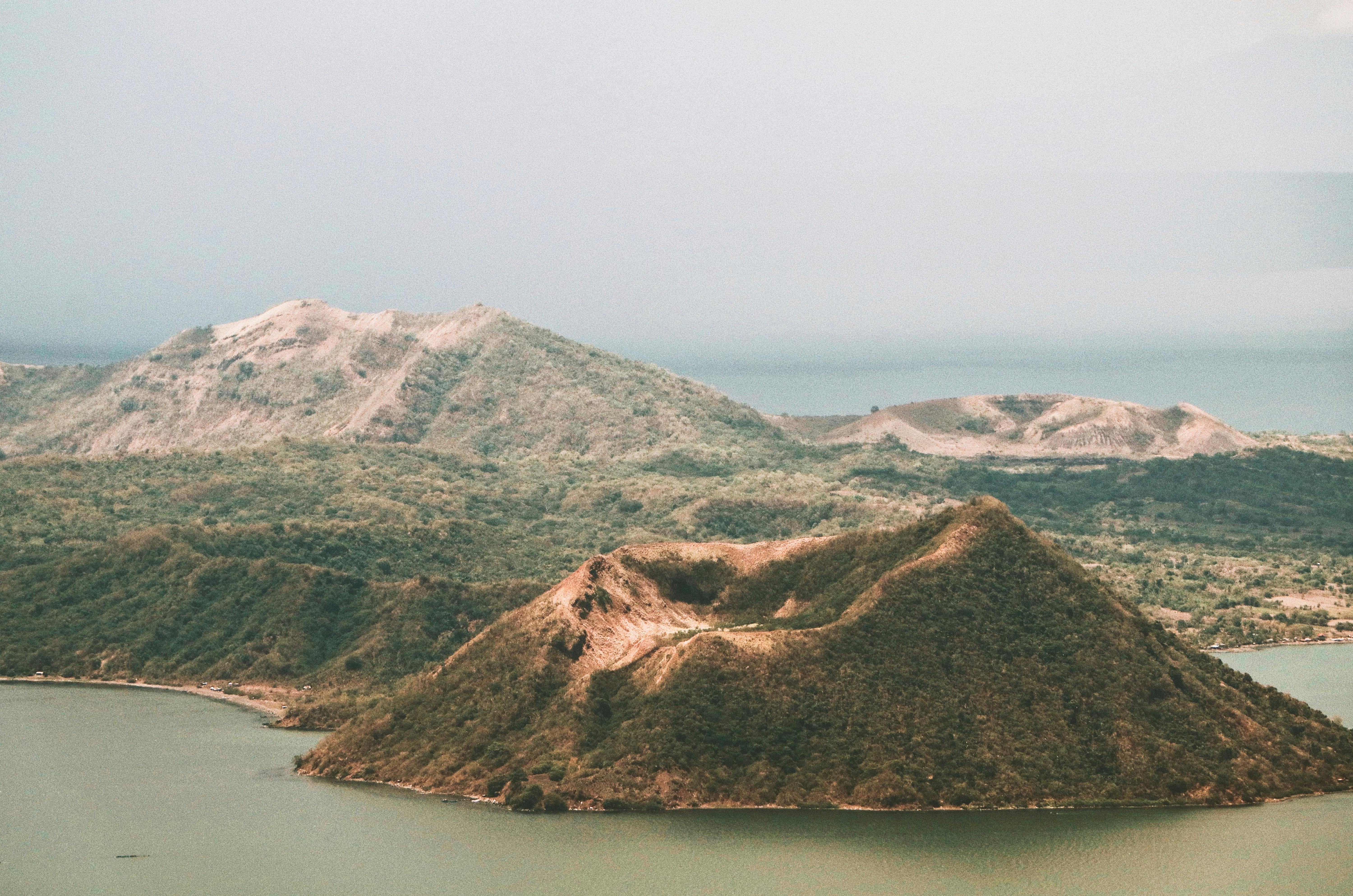 Photo of Mountains Near Ocean · Free Stock Photo